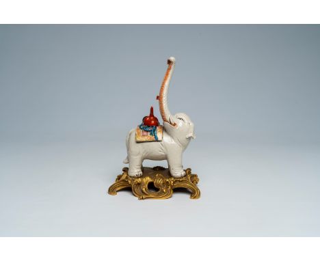 Full title: A Japanese Kutani model of an elephant bearing a tengu mask, Meiji, 19th C.Description:H 20,9 - L 14,3 cm The abs