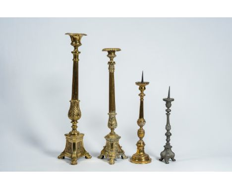 Full title: Four various brass and pewter church candlesticks, 19th/20th C.Description:H 127 - 76,2 cm (the largest and the s