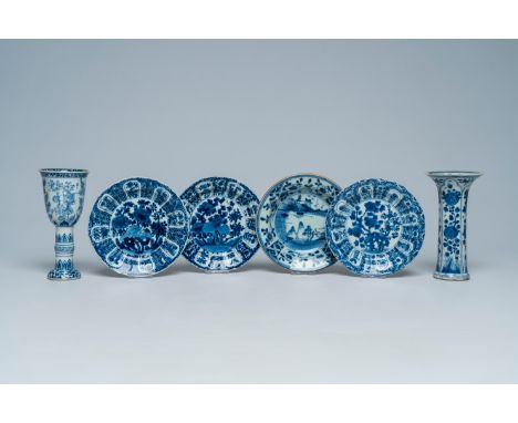 Full title: Four Chinese blue and white saucer dishes, a vase and a wine cup after a European model with floral design, Kangx