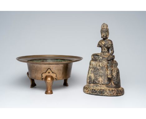 Full title: A Korean bronze tripod censer and an iron model of Guanyin, 19th C. or earlierDescription:H 41,4 cm (the Guanyin 