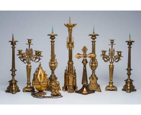 Full title: A varied collection of bronze and brass candlesticks, a thurible and an Art Deco crucifix, 19th/20th C.Descriptio