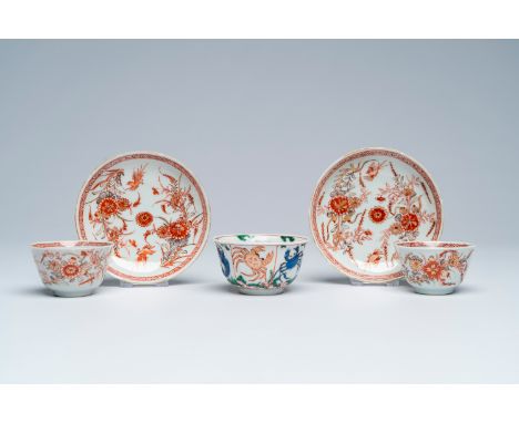 Full title: A pair of Chinese iron-red and gilt cups and saucers and a famille verte cup with crabs and fish, KangxiDescripti