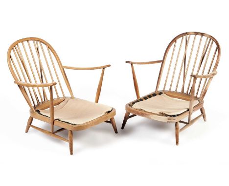 Lucian Ercolani for Ercol: a pair of 'Windsor' model 203 beech and elm easy armchairs, with spindle backrest and upswept arms