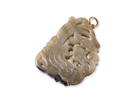 A LARGE CARVED JADE PLAQUE PENDANT BY POH HENG Featuring a carved 'pheonix' jade plaque, mounted in a yellow gold setting wit