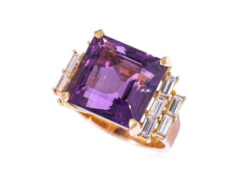 AN AMETHYST AND DIAMOND RING
Featuring a square step cut amethyst weighing approximately 9.5 Cts, mounted in an unmarked yell