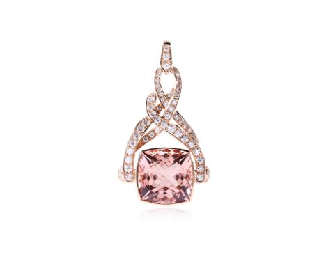 A LARGE MORGANITE AND DIAMOND PENDANT Featuring a cushion cut orange pink morganite weighing approximately 26.35 Cts, mounted