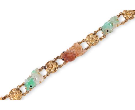 A JADE 'GOLDFISH' BRACELET
Featuring various coloured carved jade 'goldfish', mounted to a Chinese marked gold bracelet setti