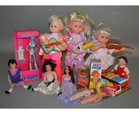 An interesting selection of dolls, some boxed and bagged, together with various unboxed items including 3 modern battery oper