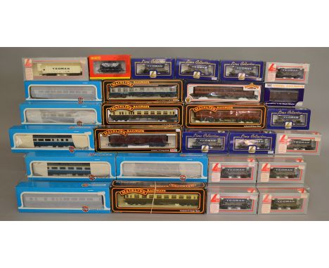 OO Gauge. 11 boxed Coaches by Airfix, Mainline and Bachmann together with 16 boxed items of Rolling Stock by Hornby, Lima, Ma