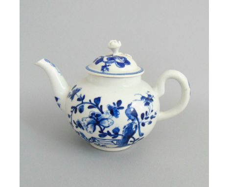 A Worcester blue and white tea pot with a matched cover, 'Rock Warbler' pattern, circa 1758, workman's mark under handle, 15.