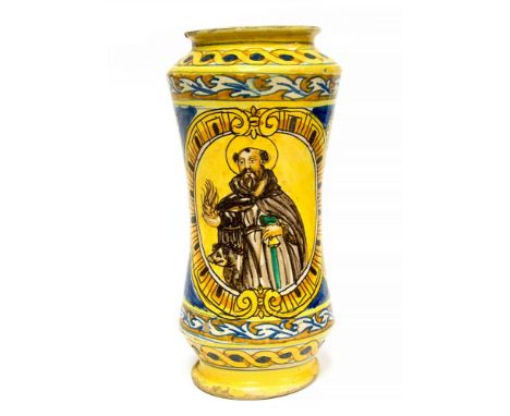 A 17th century style Italian maiolica albarello or apothecary jar, waisted form with image of a saint, 30cm high