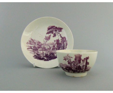 A rare Worcester tea bowl and saucer, with a puce printed  scene of a ruin and a fisherman, circa 1765, tea bowl 7.2cm diamet