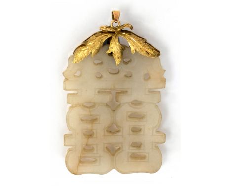 A Chinese carved jade pendant on 14 carat gold mount, reticulated symbols, 8cm long