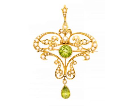 An Edwardian 15ct peridot and seed pearl set pendant/brooch, the central round faceted peridot approximately 8mm diameter, th