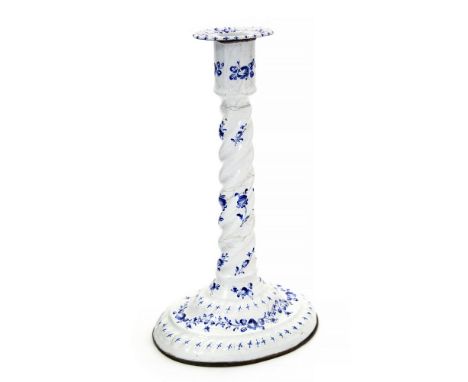 An 18th Century white enamel single candlestick, possibly Continental, blue floral decoration, detachable bobeche, spiral col