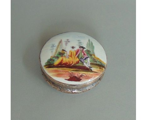 A  South Staffordshire  Bilston round  enamel box on a metal mount with a tortoiseshell base, lovers by an obelisk, circa  17
