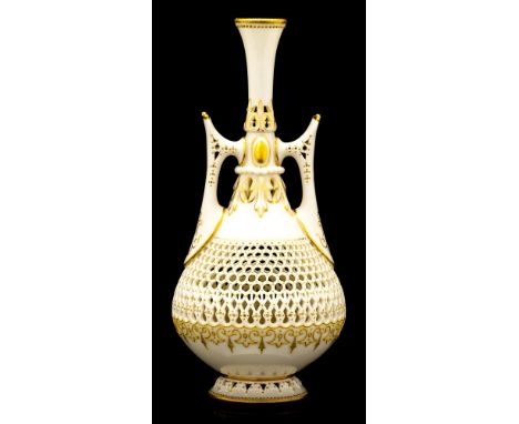 George Owen for Royal Worcester, a reticulated twin handled vase, 1910, Perisan bottle form with pierced and moulded handles,