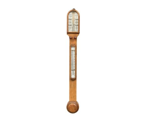 A Victorian walnut stick barometer, arched top with glass gauge signed 'J..H.Steward, London', turned wooden adjustment butto