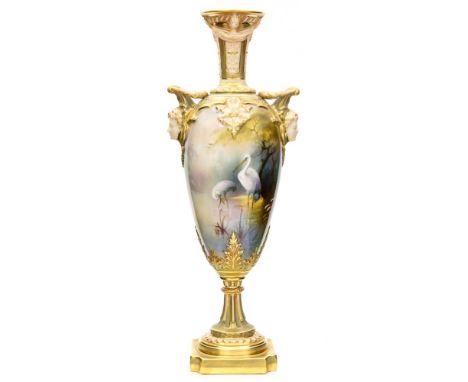 Arthur Lewis for Royal Worcester, a twin handled pedestal vase, 1909, painted in the round with storks in a misty riverside a