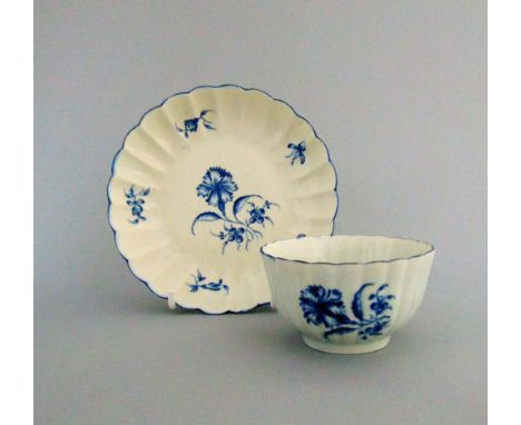 A Worcester blue and white fluted tea bowl and saucer, painted with 'The Gillyflower' pattern, circa 1770, tea bowl  7.5cm di