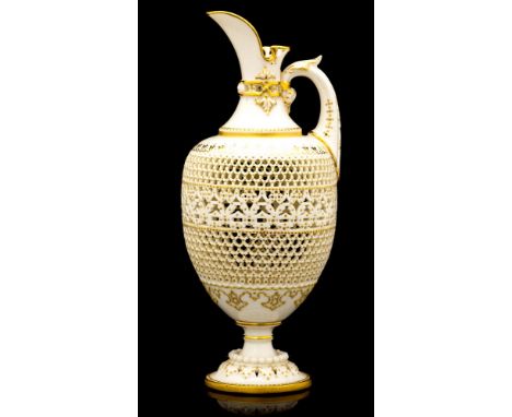 George Owen for Royal Worcester, a reticulated ewer vase, 1919, ovoid, footed form with acanthus moulded and pierced handle, 