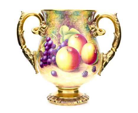 A Royal Worcester twin handled baluster vase, fully covered fruit painting with  (leaf) acanthus gilt handles painted and sig