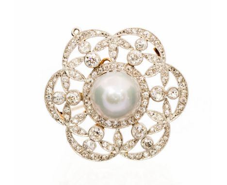 An Art Deco cultured pearl and diamond flower head cluster pendant/brooch, the button shaped central cultured pearl approxima