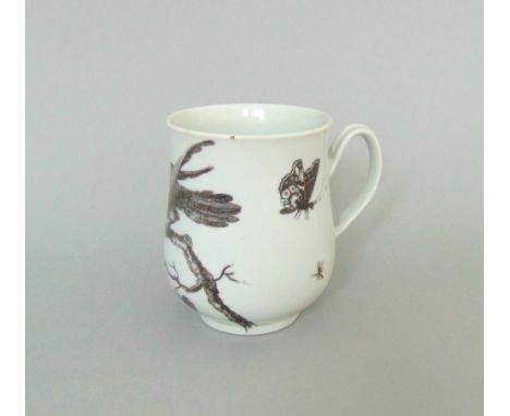 A rare Worcester small bell shaped mug with a black printed 'Parrot Pecking Fruit' pattern, circa 1758, 9cm high, 6.5cm diame
