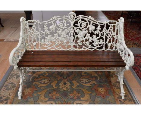 A Victorian white painted cast iron garden bench, possibly Coalbrookdale