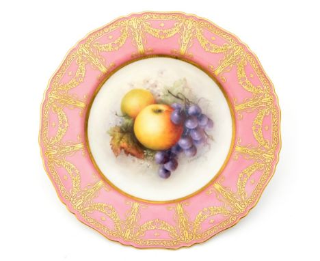 A Royal Worcester cabinet plate painted with fruit by R Sebright, within a pink and raised gilt border, 23cm diameterConditio