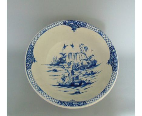A Worcester blue and white wash basin, painted with 'The Willow Bridge Fisherman' pattern, circa 1765, 28.5cm diameter, 14.5c
