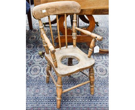 A 19th Century ash child's commode chair