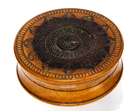 Treen, a late 18th, early 19th century boxwood/fruitwood circular snuff box with a carved geometric pattern, diameter 7cm