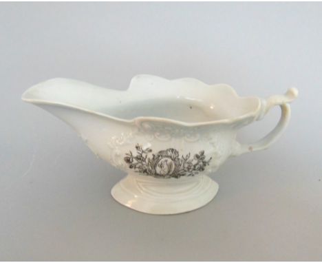 A Worcester sauce boat, primitive printed with a squirrel, a pheasant and inside a 'Les Amusements Champetres' print, circa 1