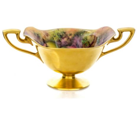 A Royal Worcester fruit painted twin handled cup with unevenly cut rim, circa 1910, fruit design painted by H.F. Price