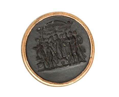 A late 18th century/early 19th century black basalt seal with a classical scene, gilt metal bezel surround and loop, possibly