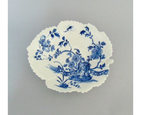 A rare early Worcester vine leaf shaped dish, painted in underglaze blue with foliage and a fence, circa 1758    painter's ma
