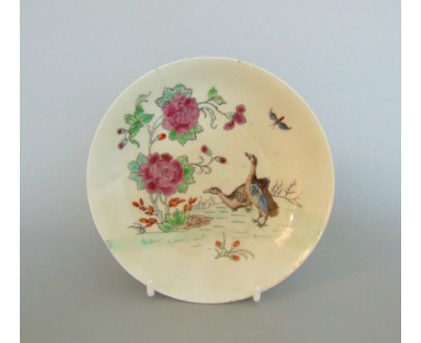 A Worcester polychrome saucer, with famille rose, decoration along with water fowl, circa 1756-58, 12.3cm diameterProvenance: