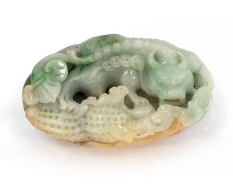 A Chinese carved jade pendant, with buffalo and bad amongst gourds, 8cm long