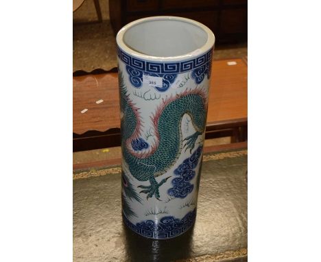 A reproduction Chinese dragon decorated porcelain stick stand
