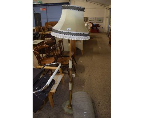 An onyx mounted standard lamp