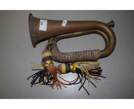 A vintage copper bugle