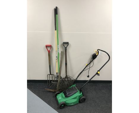 A Kingfisher electric lawnmower, together with a bundle of garden tools and a pickaxe and two hanging baskets 