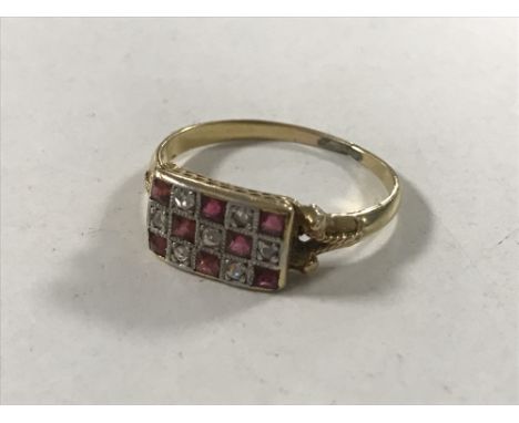 An 18ct gold ruby and diamond ring, size O.