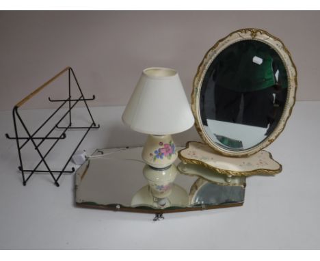A frameless bevel edge mirror, together with a cream and gilt oval dressing table mirror, china table lamp with shade, togeth