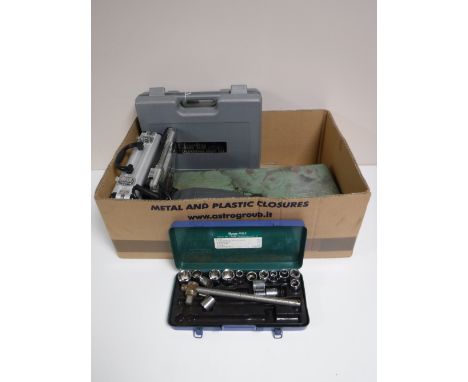 A metal concertina tool box and tools, box of Clarke soldering gun, cased socket sets, electric saw, drill bits etc 
