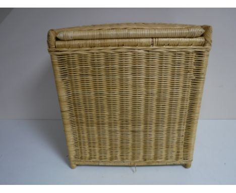 A wicker laundry hamper 
