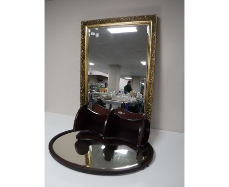 A gilt framed bevel edge over mantle mirror, an oval mahogany framed mirror and a wall shelf 