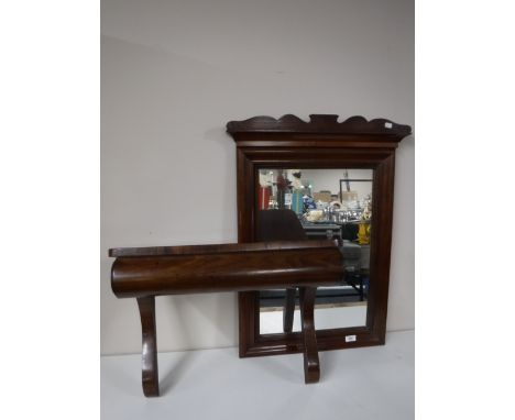 A late 19th century mahogany wall mirror with shelf