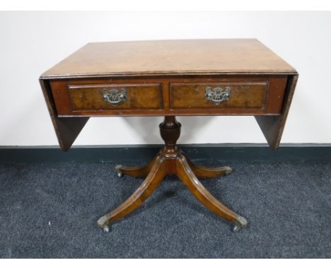 A walnut drop end pedestal sofa table, fitted two drawers